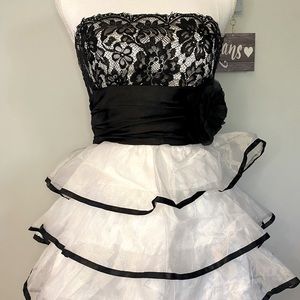Black and white ruffle mini dress